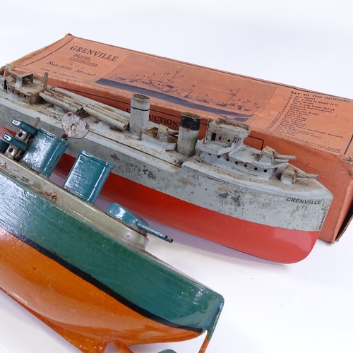 210 - 2 Sutcliffe pressed steel clockwork toy boats; Grenville (boxed), and Valiant, length approx 33cm