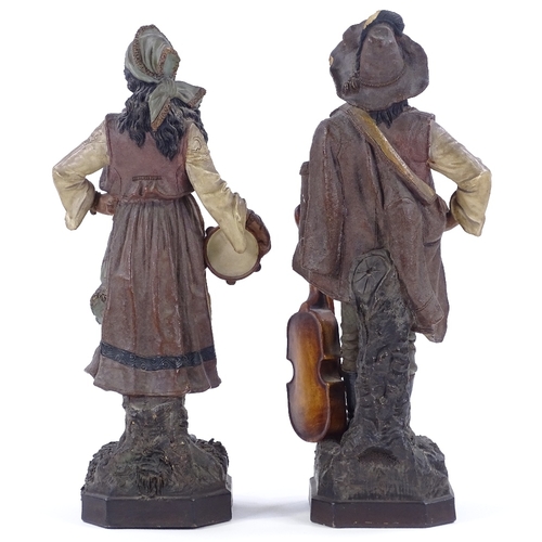 28 - A pair of 19th century Continental terracotta figures, with painted decoration, impressed maker's ma... 