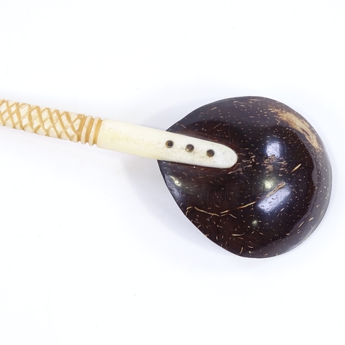 43 - A Turkish Ottoman sweet spoon, with lacquer bowl and carved ivory handle, length 26cm