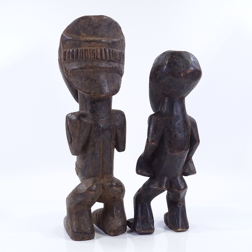 45 - 2 African Tribal carved wood fertility figures, largest height 31cm