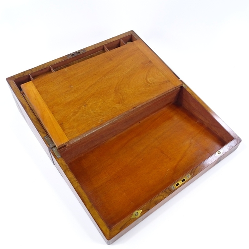 55 - A Victorian brass-bound walnut writing slope, with fitted interior and original inkwells, width 45cm