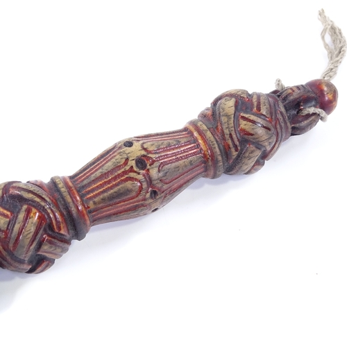 63 - A Tibetan carved and painted wood ceremonial dagger, length 25cm