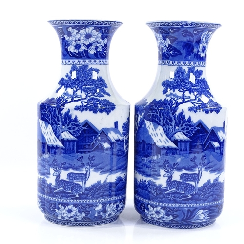 71 - A pair of Wedgwood Pottery Fallow Deer pattern blue and white vases, height 30cm