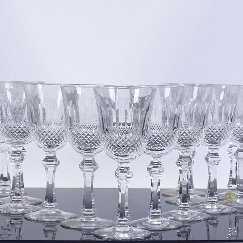 73 - A set of 80 cut-glass Sherry/Port glasses, height 14cm