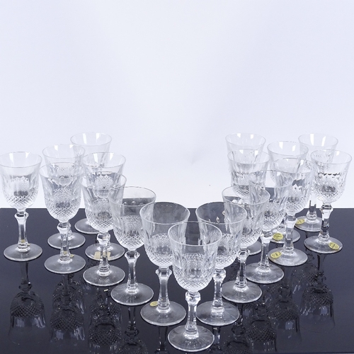 73 - A set of 80 cut-glass Sherry/Port glasses, height 14cm