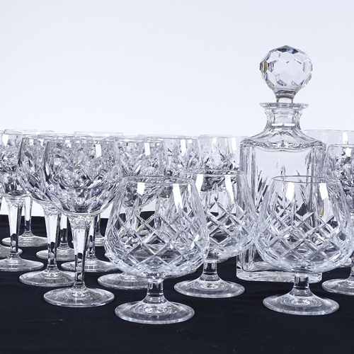 77 - A suite of cut-glass drinking glasses, and a cut-glass decanter (29)