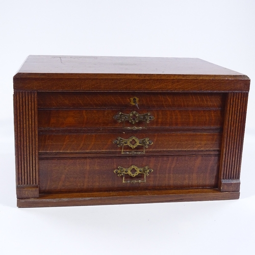 79 - A canteen of plated cutlery and servers for 12 people, with ivory handles, circa 1900, in oak cantee... 