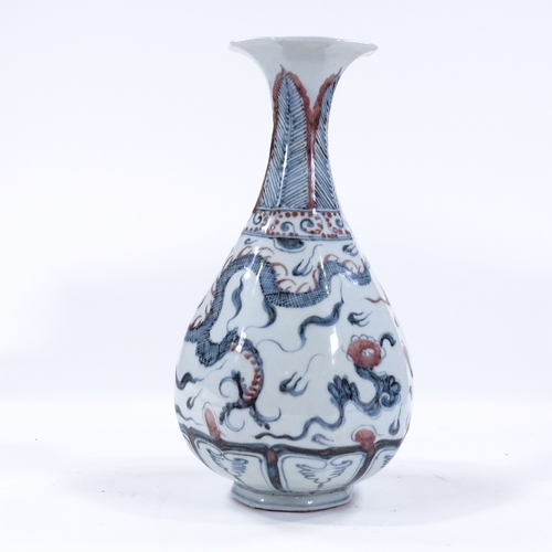 83 - A Chinese blue and white porcelain narrow-necked dragon vase, height 28cm