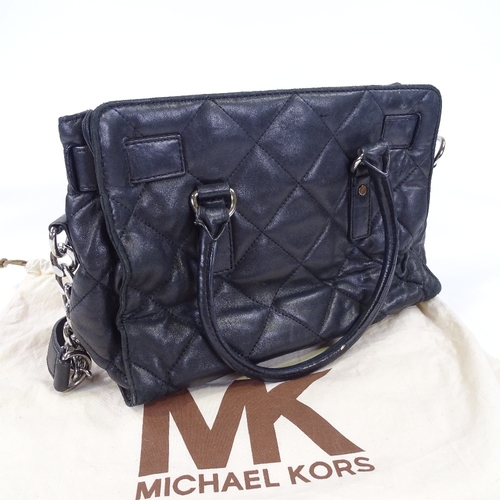 86 - A Michael Kors black quilted leather handbag with dust bag