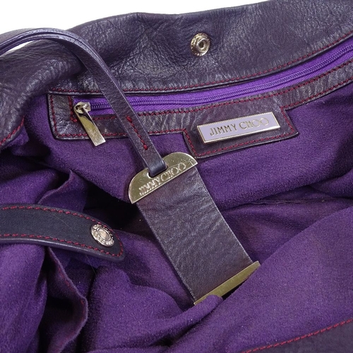 87 - A Jimmy Choo purple leather holdall bag