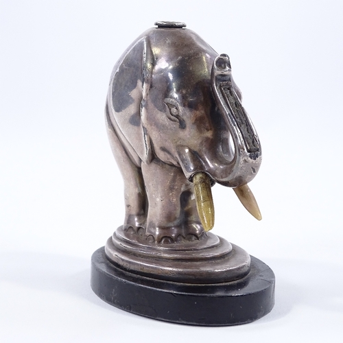 9 - An Art Deco electroplate elephant design table lighter, no visible factory marks, height 10.5cm