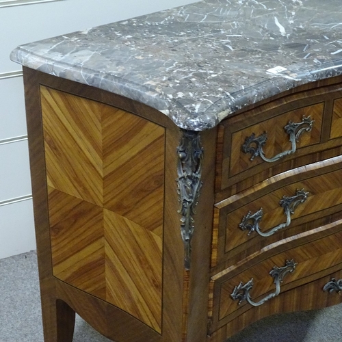 233 - A French kingwood bombe commode, early 20th century, with shaped marble top, 3 long drawers with cas... 