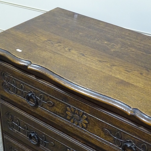 236 - A French oak chest of 3 long drawers, circa 1900, with carved drawer fronts and shaped top, width 3'... 