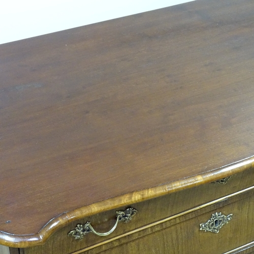 244 - A 19th century Dutch mahogany bombe chest of 4 drawers, with brass handles and mounts, width 2'9