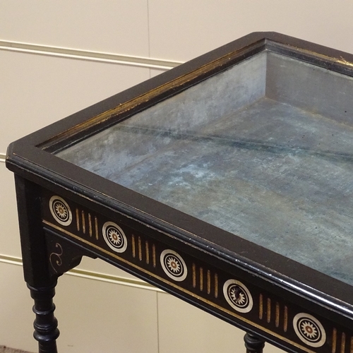 245 - A 19th century ebonised vitrine table, width 23