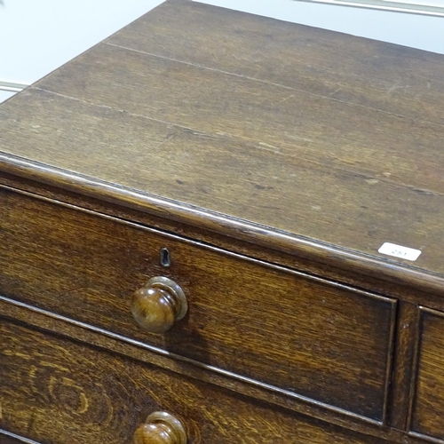 251 - A George III oak square chest of 3 long and 2 short drawers, with turned handles and bracket feet, w... 