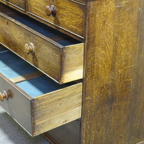 251 - A George III oak square chest of 3 long and 2 short drawers, with turned handles and bracket feet, w... 