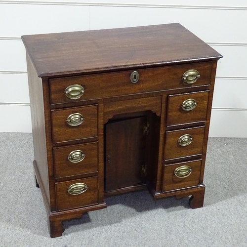 258 - A George III mahogany kneehole writing desk of small size, with drawers and alcove cupboard, width 2... 