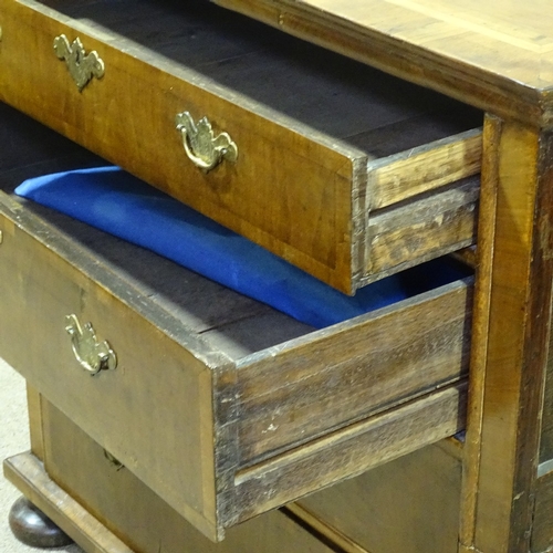 264 - An 18th century walnut chest of 4 long drawers, with inlaid banding, width 3'3