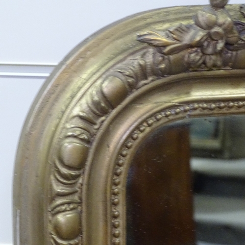 266 - A 19th century gilt-gesso framed wall mirror, with acanthus pediment, height 4'10, width 2'11