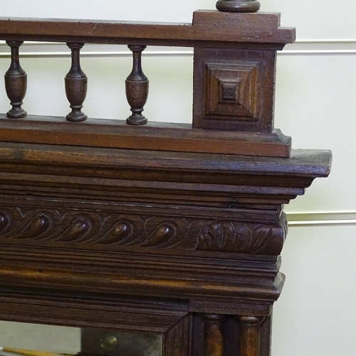 268 - A 19th century French carved oak-framed wall mirror, with fluted columns, height 4'6