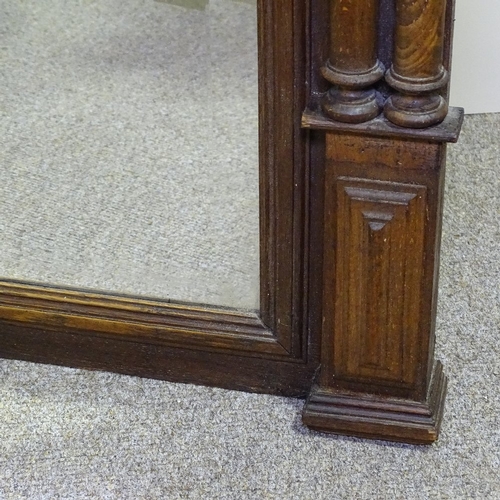 268 - A 19th century French carved oak-framed wall mirror, with fluted columns, height 4'6