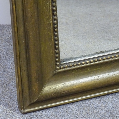 275 - A Victorian moulded gilt-framed wall mirror, 2'10