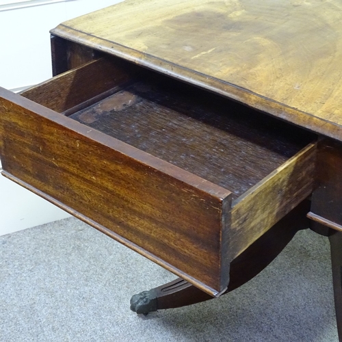 277 - A George IV mahogany drop leaf breakfast table, on quadruple base