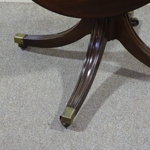 278 - A circular mahogany tilt-top table on quadruple base, 35.5