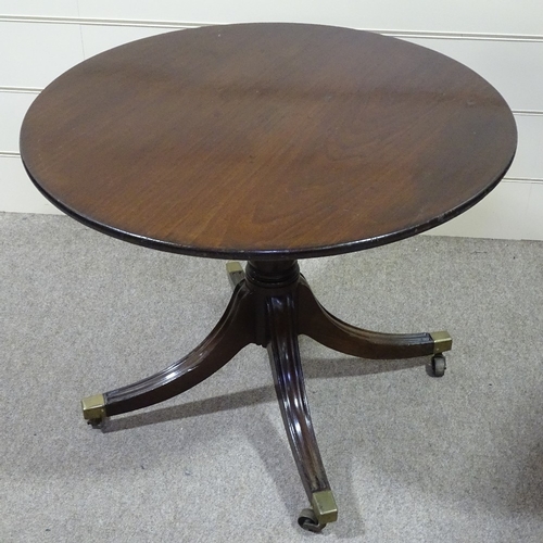 278 - A circular mahogany tilt-top table on quadruple base, 35.5