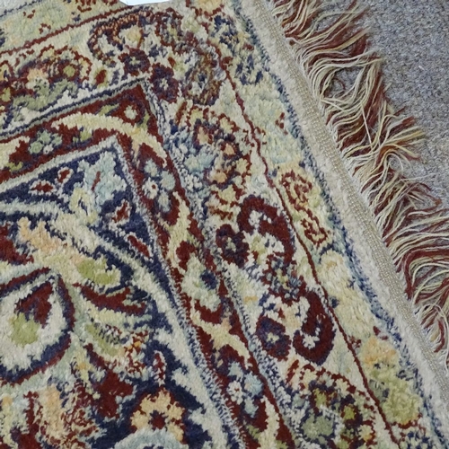 280 - A large oriental silk rug, with exotic bird decoration