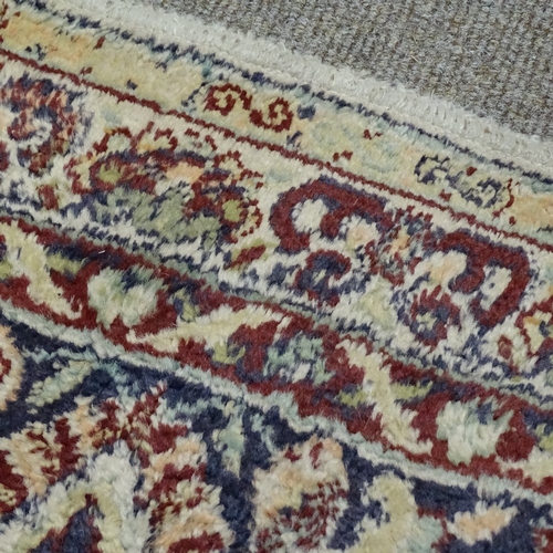 280 - A large oriental silk rug, with exotic bird decoration