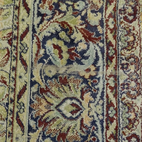 280 - A large oriental silk rug, with exotic bird decoration