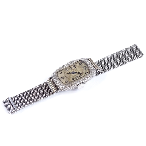 303 - An Art Deco lady's platinum and diamond cocktail wristwatch, by Goldsmiths and Silversmiths Co Ltd, ... 