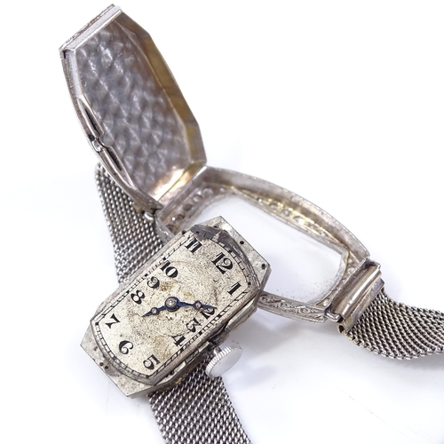 303 - An Art Deco lady's platinum and diamond cocktail wristwatch, by Goldsmiths and Silversmiths Co Ltd, ... 