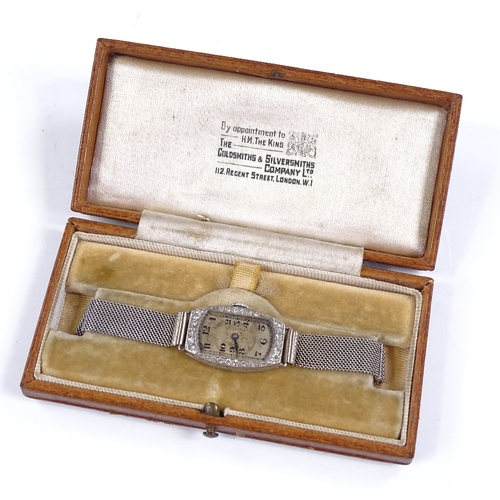 303 - An Art Deco lady's platinum and diamond cocktail wristwatch, by Goldsmiths and Silversmiths Co Ltd, ... 