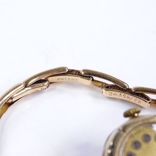 310 - A Vintage lady's 9ct gold mechanical wristwatch, gilded dial with Deco Arabic numerals and blued ste... 