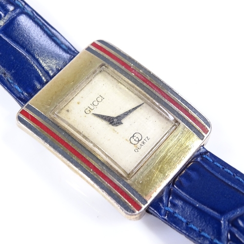 332 - A lady's Gucci quartz wristwatch, silver-gilt case with enamel band bezel, case width 24mm