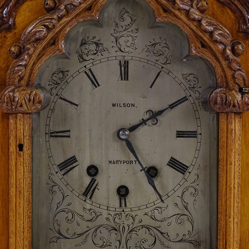 333 - A Victorian Gothic light oak-cased bracket clock, with elaborately carved architectural case with co... 