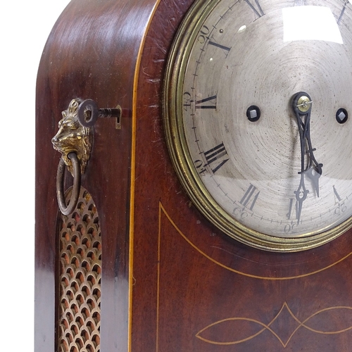 335 - A mahogany dome-top mantel clock, circa 1900, with inlaid boxwood stringing, engraved silvered dial ... 