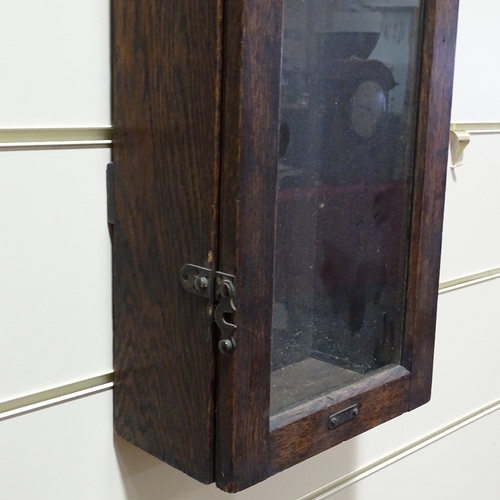 338 - A Synchronome electric wall clock in oak case, circa 1920, height 126cm