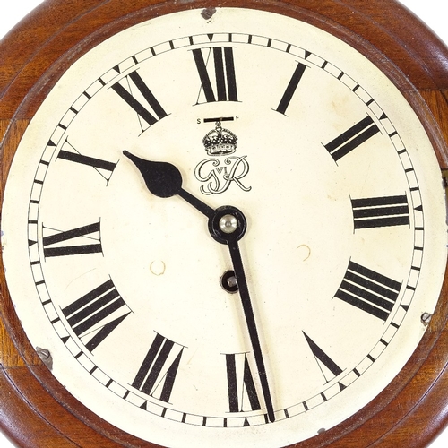 341 - A George VI mahogany-cased dial wall clock of small size, 20cm dial, 27cm diameter overall