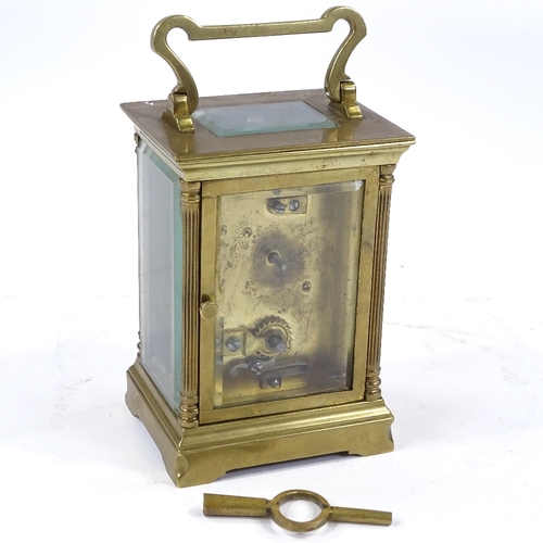 346 - A French brass-cased carriage clock with corner columns, case height 11cm