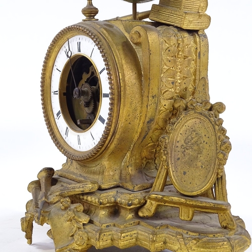 347 - A 19th century gilt-metal cased mantel clock, surmounted by a 3