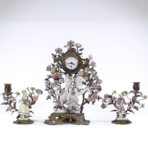 350 - A 19th century French gilt-bronze and porcelain 3-piece clock garniture, surmounted by a figure on h... 