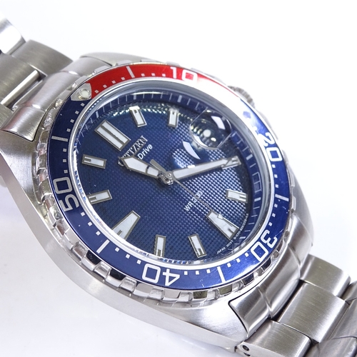 354 - CITIZEN - a stainless steel Eco-Drive WR 200 wristwatch, blue dial with luminous hour batons and mag... 