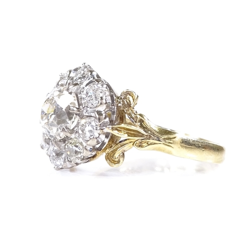 382 - An 18ct gold diamond cluster ring, central old mine-cut diamond measures 6.85mm x 6.62mm x 4.53mm, s... 