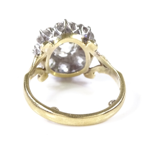 382 - An 18ct gold diamond cluster ring, central old mine-cut diamond measures 6.85mm x 6.62mm x 4.53mm, s... 