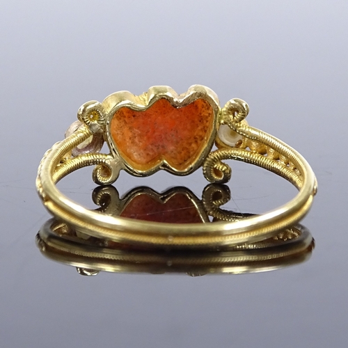 385 - A Georgian unmarked gold carved coral and split-pearl double-heart ring, with milled shank, setting ... 