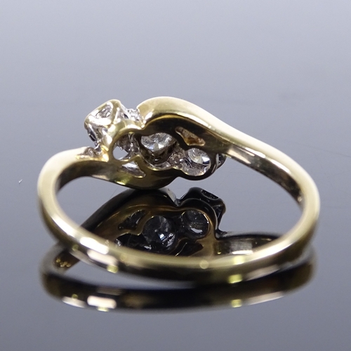 389 - A 9ct gold 3-stone diamond crossover ring, total diamond content approx 0.25ct, setting height 7.8mm... 